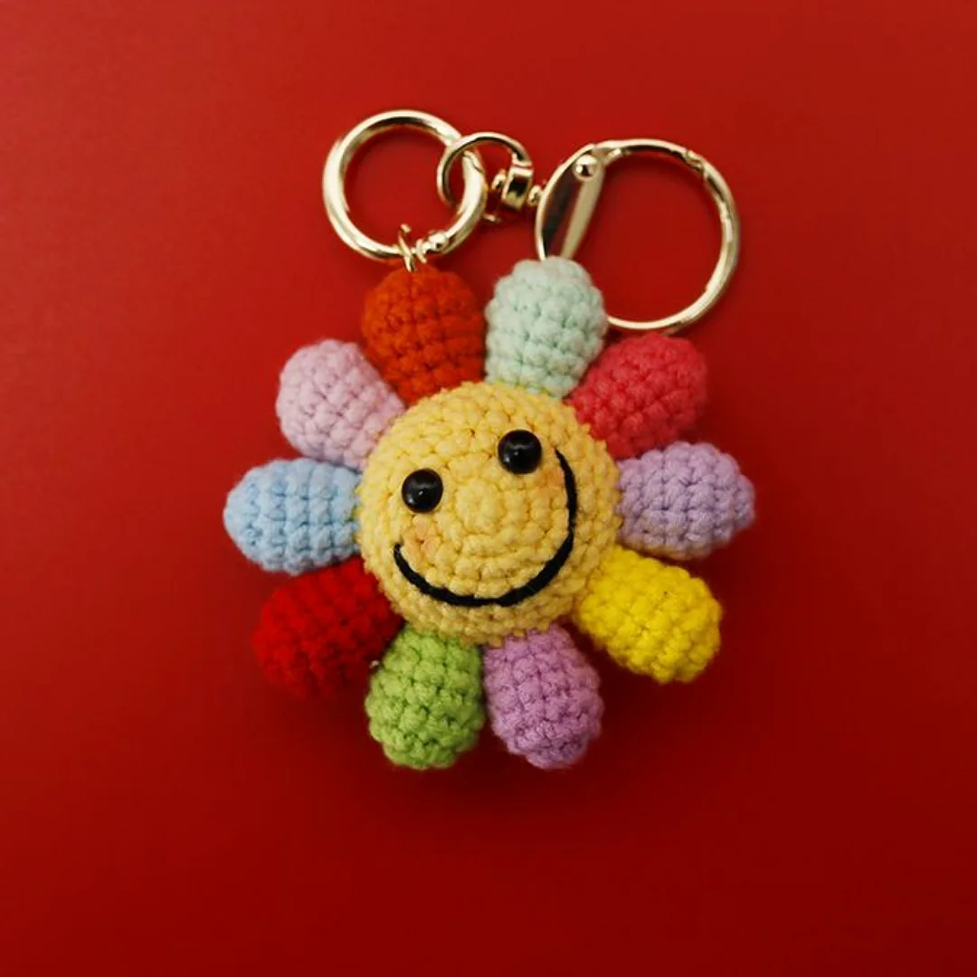 Smiley Flower Keychain — handmade crochet keychain from @crochet_keychains.pk