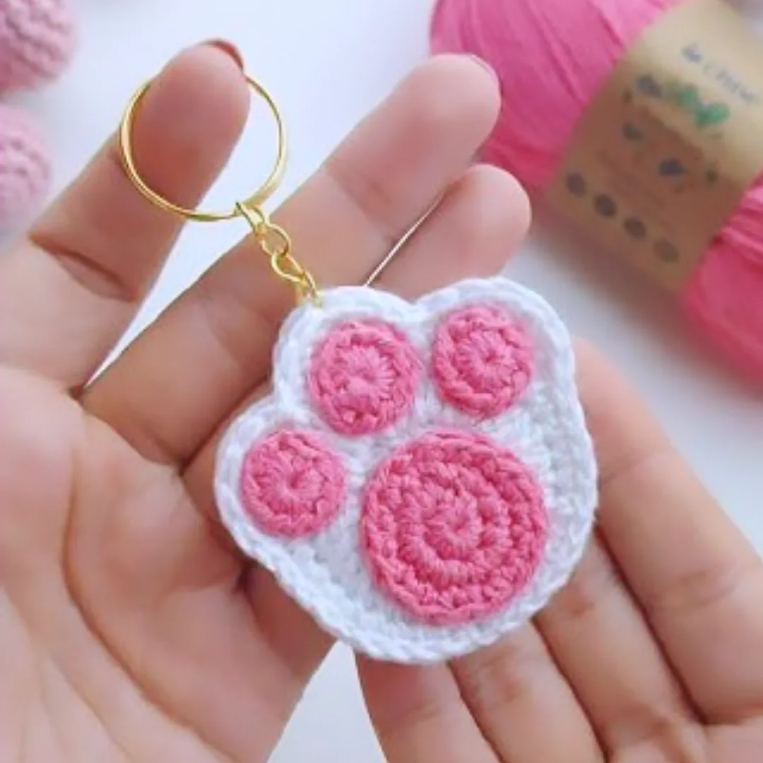 Cat Paw Charm — handmade crochet keychain from @crochet_keychains.pk