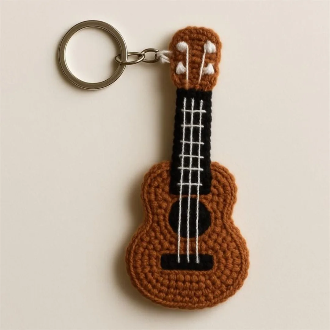Ukulele Keychain — handmade crochet keychain from @crochet_keychains.pk