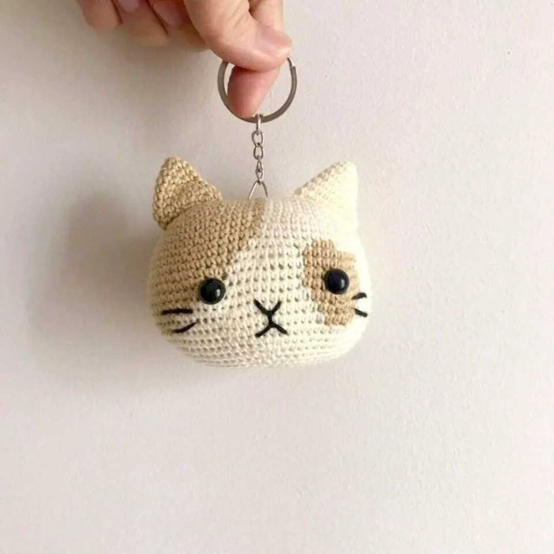 Cat Face Keychain — handmade crochet keychain from @crochet_keychains.pk