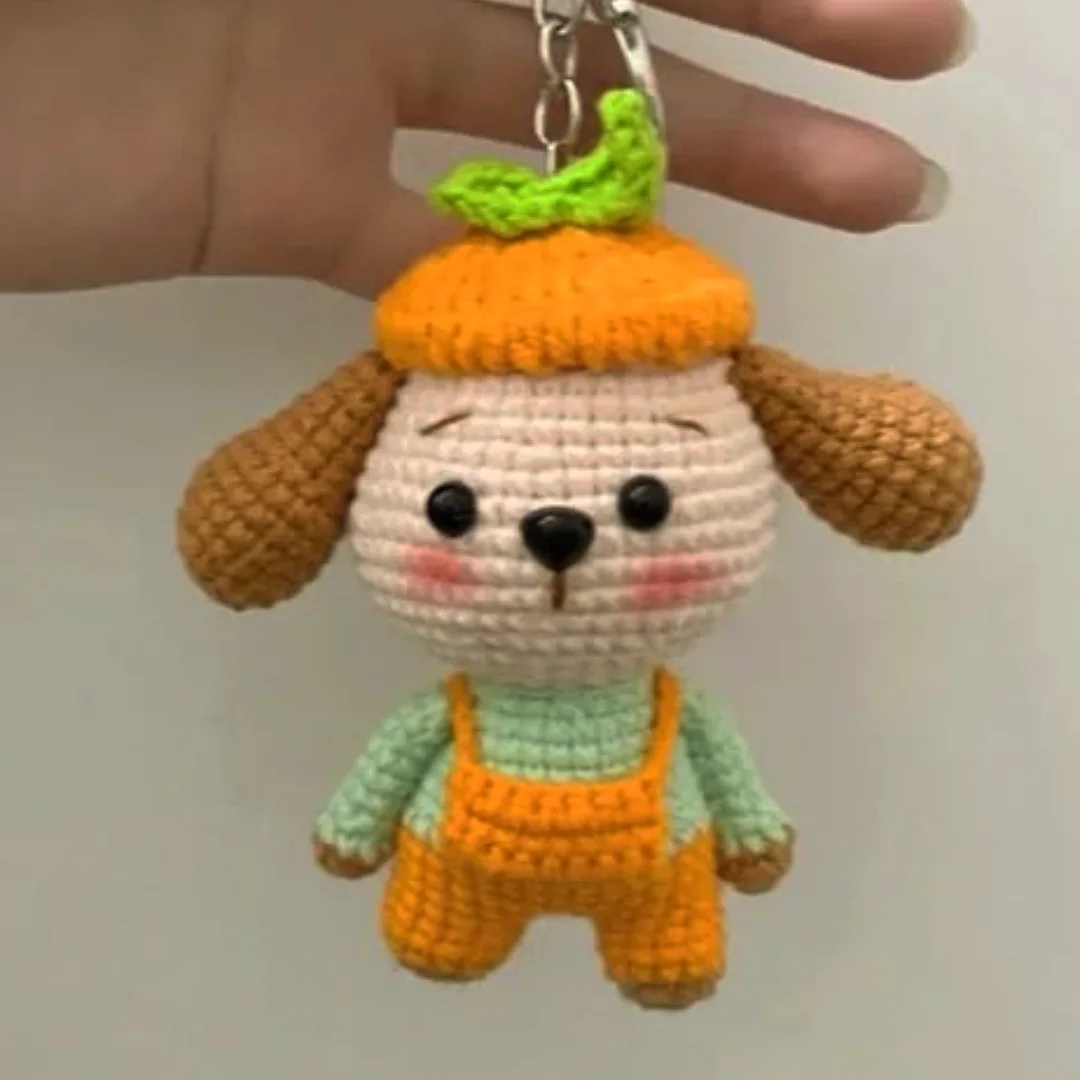 Orange Hat Puppy Keychain — handmade crochet keychain from @crochet_keychains.pk