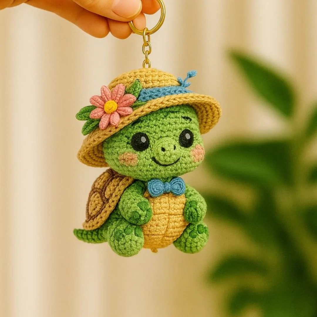 Sun Hat Turtle Charm — handmade crochet keychain from @crochet_keychains.pk