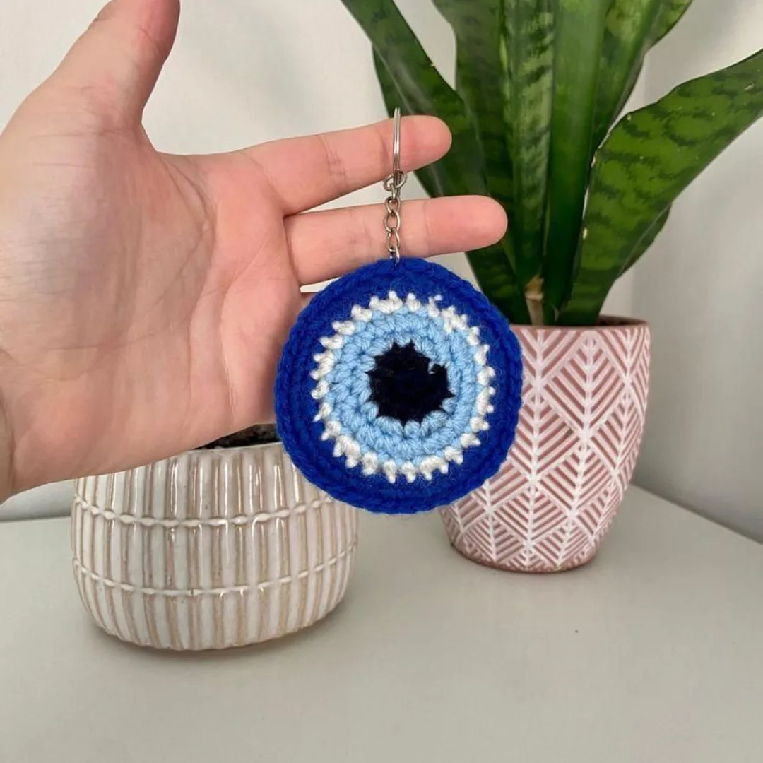 Evil Eye Keychain — handmade crochet keychain from @crochet_keychains.pk